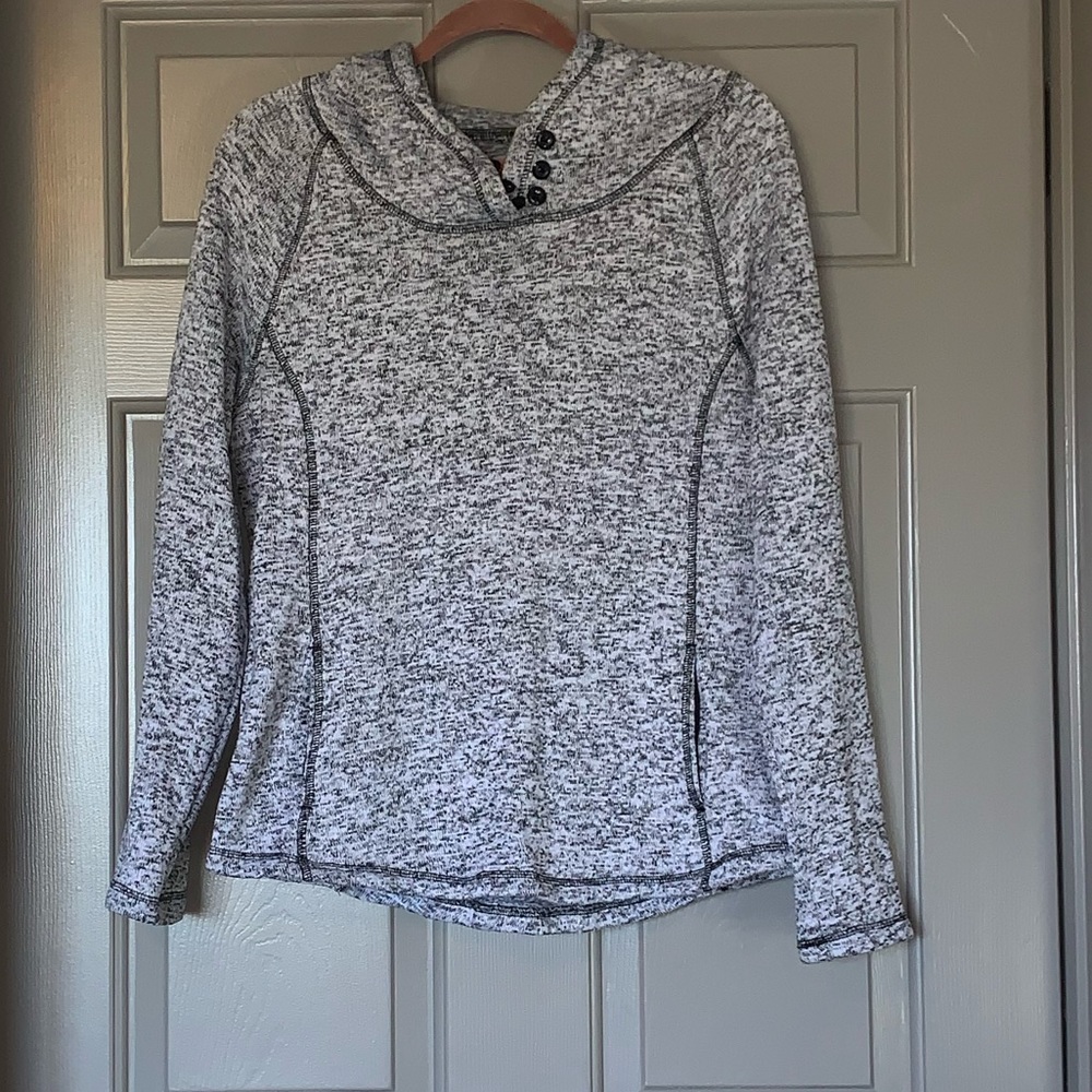 Grey fuzzy sweater.